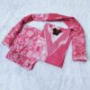 Woman wearing pink cotton floral print suit set with matching dupatta