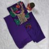 Woman wearing purple silk blend floral print suit with embroidered neckline and matching dupatta