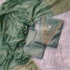 Elegant green Vatican fabric suit set with embroidered V-neck kurta, straight pants, and silk-finish dupatta