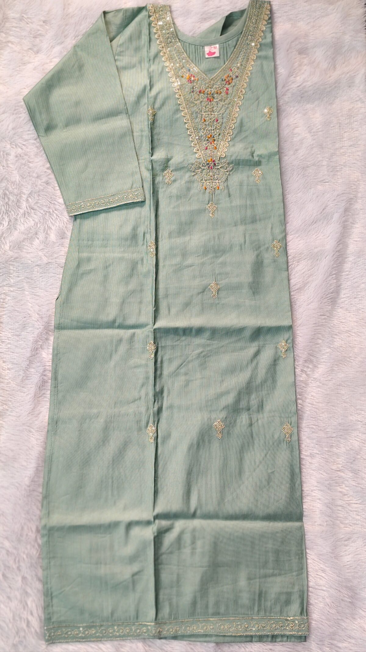 Elegant green Vatican fabric suit set with embroidered V-neck kurta, straight pants, and silk-finish dupatta