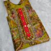 Yellow silk kurta set with paisley embroidery, mirror work, and matching floral dupatta – Indian festive outfit