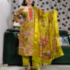 Yellow silk kurta set with paisley embroidery, mirror work, and matching floral dupatta – Indian festive outfit