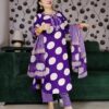 Woman wearing a premium cotton purple polka print suit set with matching pants and dupatta