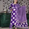 Woman wearing a premium cotton purple polka print suit set with matching pants and dupatta