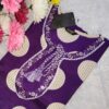 Woman wearing a premium cotton purple polka print suit set with matching pants and dupatta