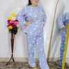 woman wearing blue printed winter fleece night suit with floral and fruit pattern