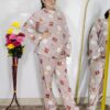 woman wearing blue printed winter fleece night suit with floral and fruit pattern