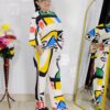 woman wearing colorful abstract print co-ord set with geometric abstract design