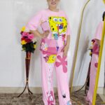 woman wearing pink cartoon print co-ord set featuring SpongeBob design