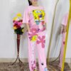 woman wearing pink cartoon print co-ord set featuring SpongeBob design