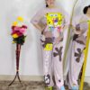 woman wearing pink cartoon print co-ord set featuring SpongeBob design