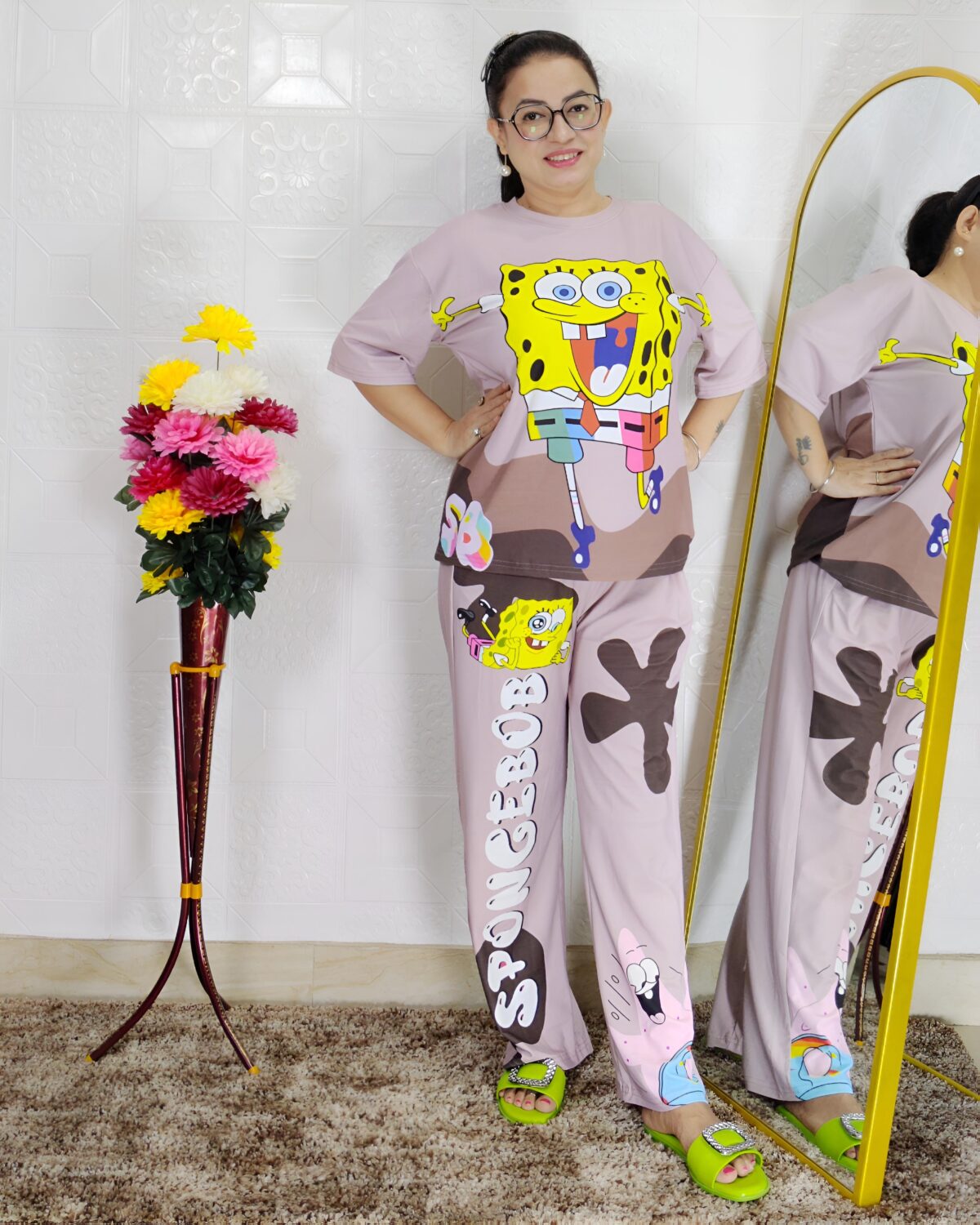 woman wearing pink cartoon print co-ord set featuring SpongeBob design