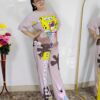 woman wearing pink cartoon print co-ord set featuring SpongeBob design