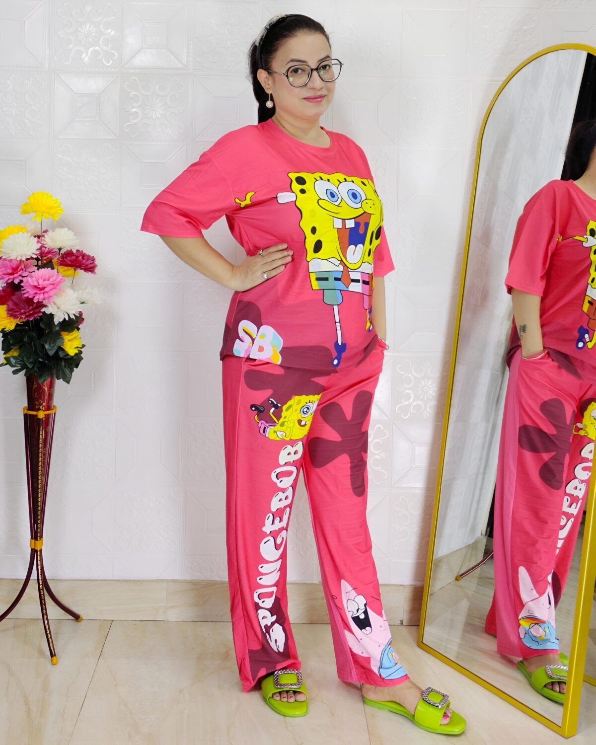 woman wearing pink cartoon print co-ord set featuring SpongeBob design