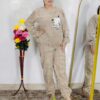 woman wearing beige soft furry winter night suit with cute cartoon embroidery