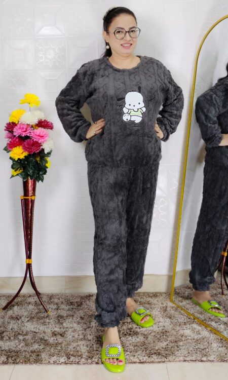 woman wearing beige soft furry winter night suit with cute cartoon embroidery