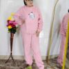 woman wearing beige soft furry winter night suit with cute cartoon embroidery
