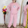 woman wearing beige soft furry winter night suit with cute cartoon embroidery