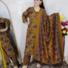 Woman wearing a premium printed pashmina suit with matching dupatta and winter bottom