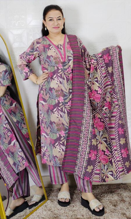 Woman wearing a premium printed pashmina suit with matching dupatta and winter bottom