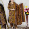 Woman wearing a premium printed pashmina suit with matching dupatta and winter bottom