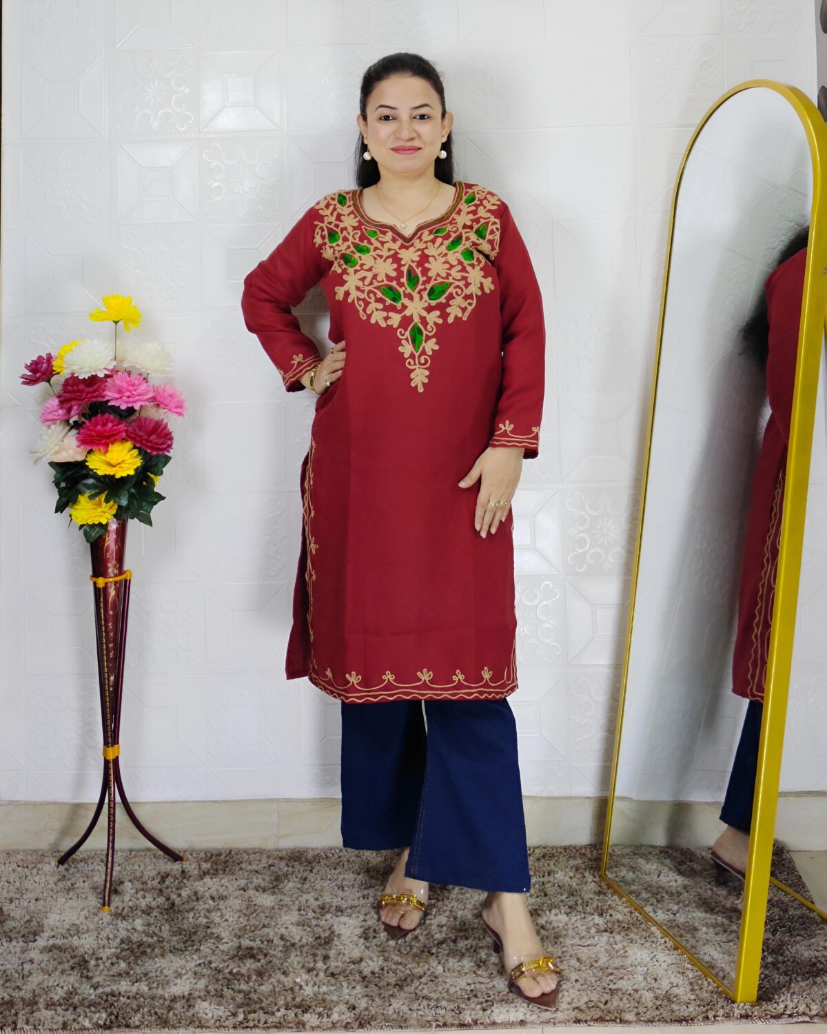Women wearing embroidered pheran kurti winter ethnic wear long kurti with floral embroidery