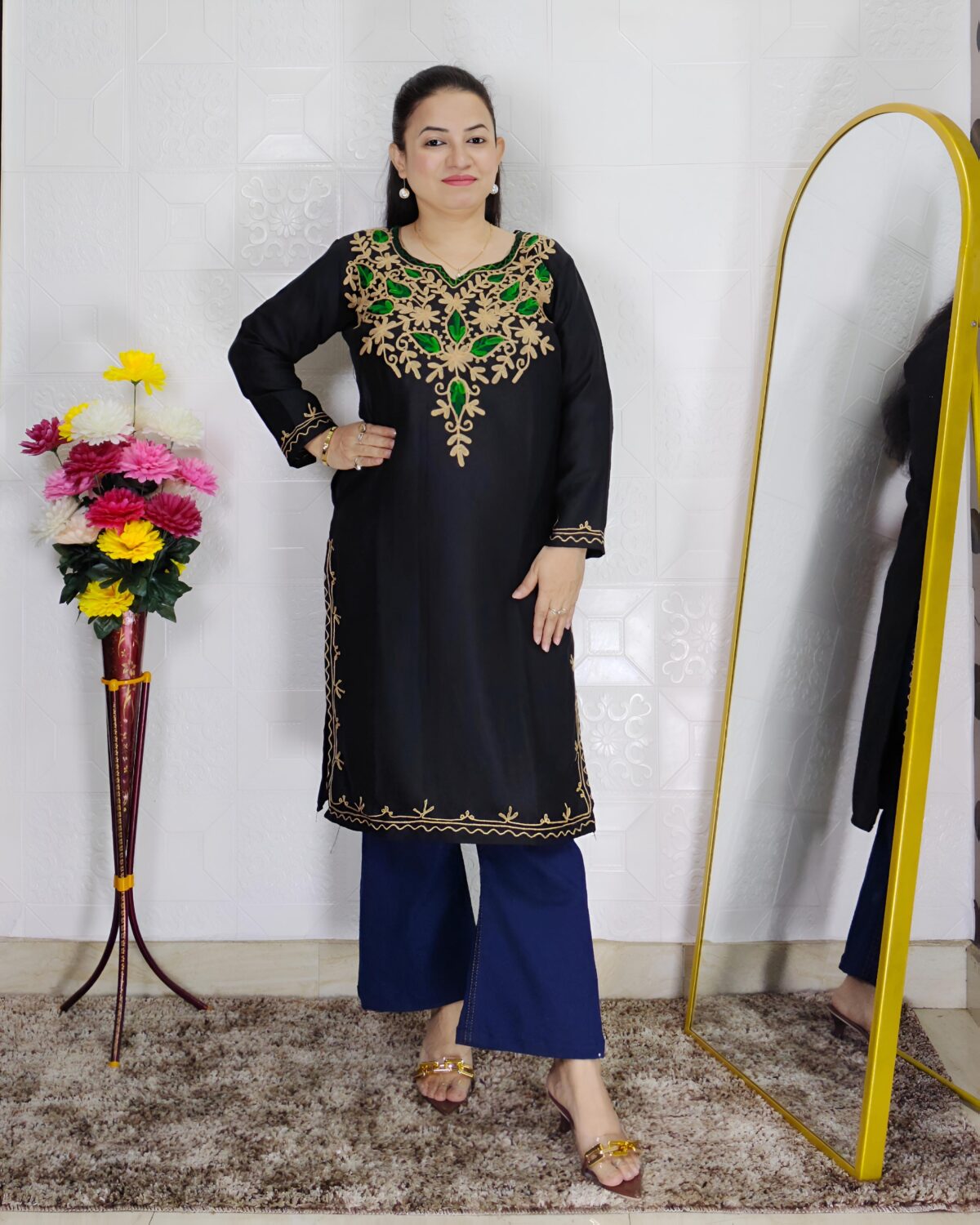 Women wearing embroidered pheran kurti winter ethnic wear long kurti with floral embroidery