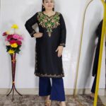 Women wearing embroidered pheran kurti winter ethnic wear long kurti with floral embroidery
