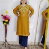 Women wearing embroidered pheran kurti winter ethnic wear long kurti with floral embroidery