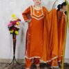 Women wearing orange Roman glass fabric embroidered kurta pant dupatta set ethnic wear suit