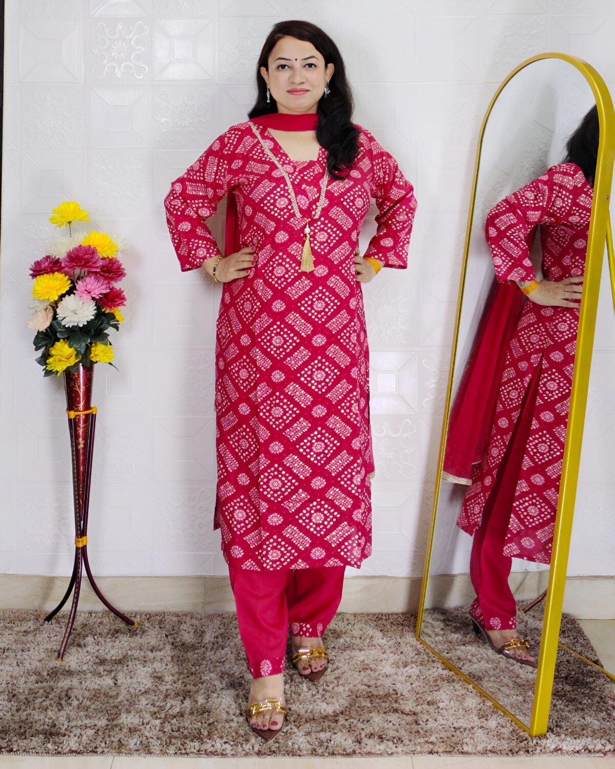 Pink bandhani printed cotton 3 piece suit set for women with tassel neckline