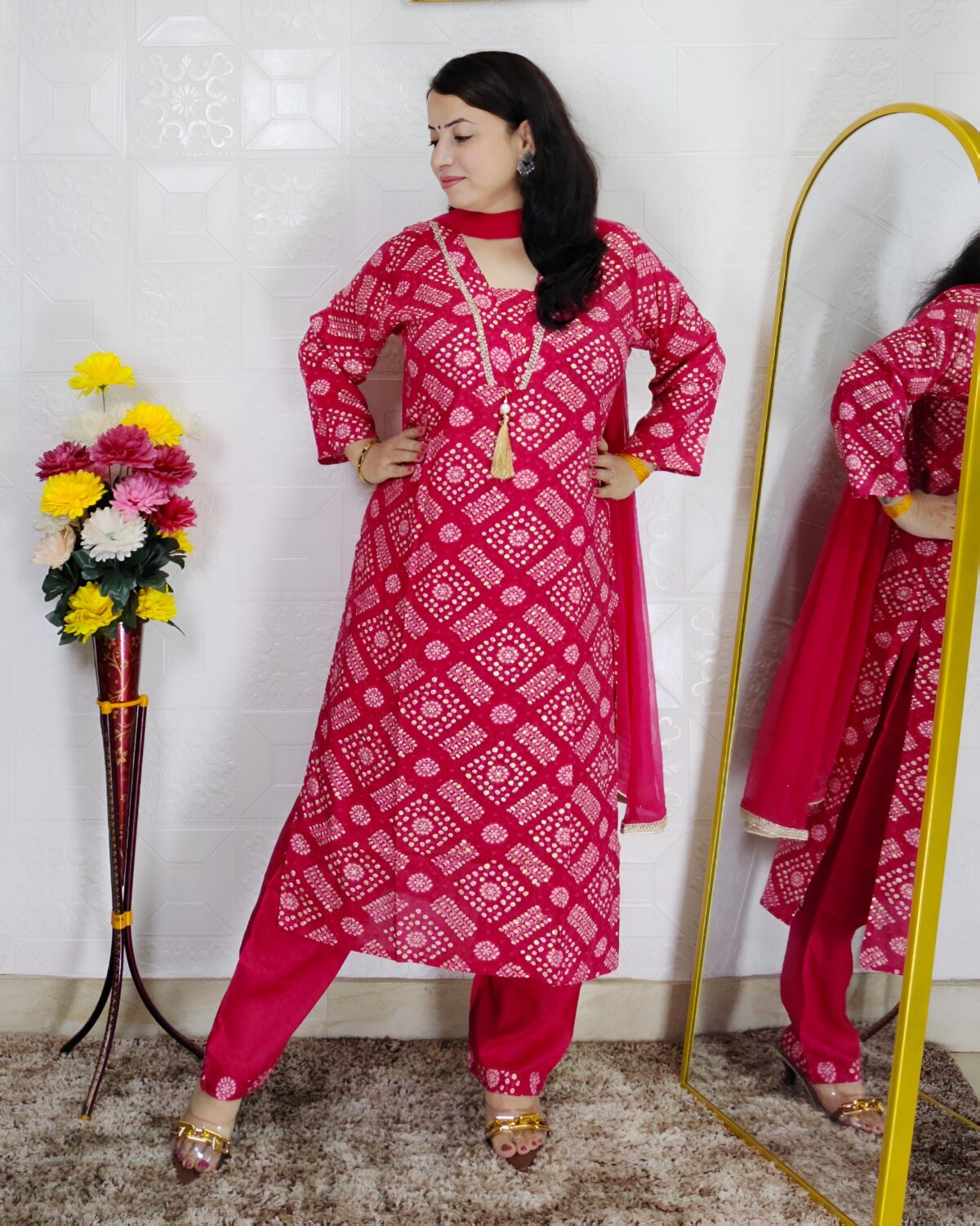 Pink bandhani printed cotton 3 piece suit set for women with tassel neckline