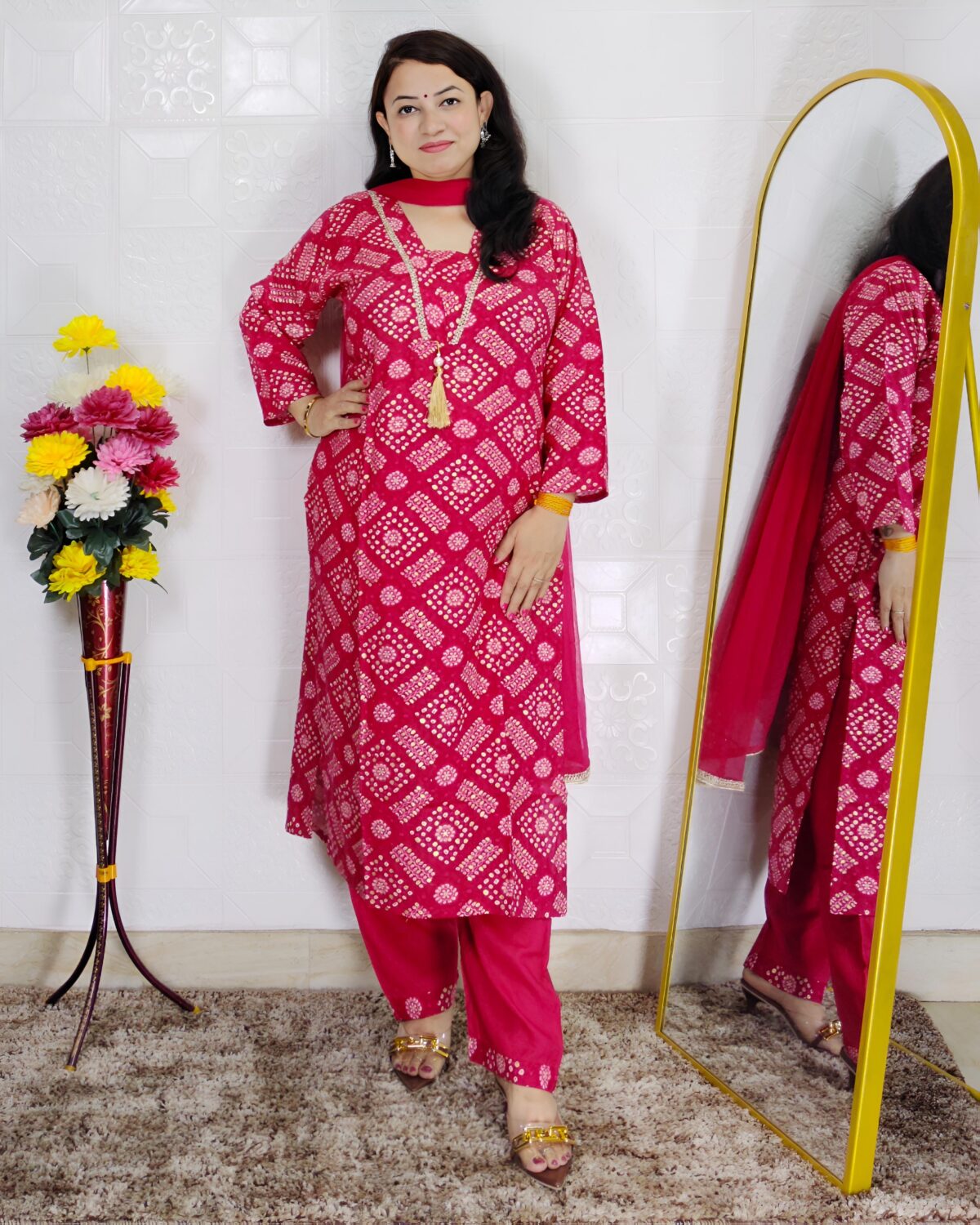 Pink bandhani printed cotton 3 piece suit set for women with tassel neckline