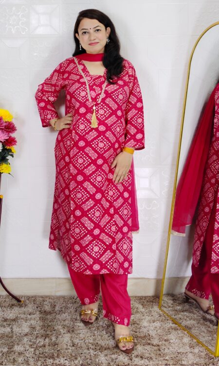 Pink bandhani printed cotton 3 piece suit set for women with tassel neckline