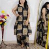 Woman wearing black floral printed cotton co-ord set with sleeveless kurta and matching pants
