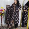 Woman wearing black printed pure cotton 3 piece suit set with matching dupatta and straight pants