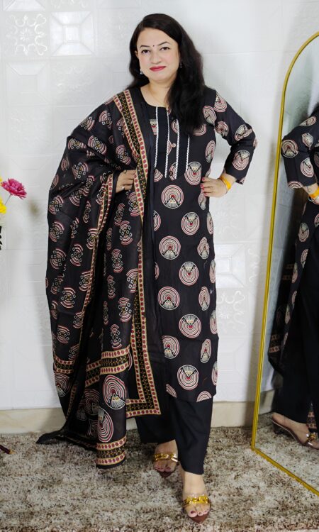 Woman wearing black printed pure cotton 3 piece suit set with matching dupatta and straight pants