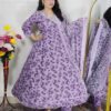 Woman wearing lavender floral printed Anarkali suit set with matching dupatta