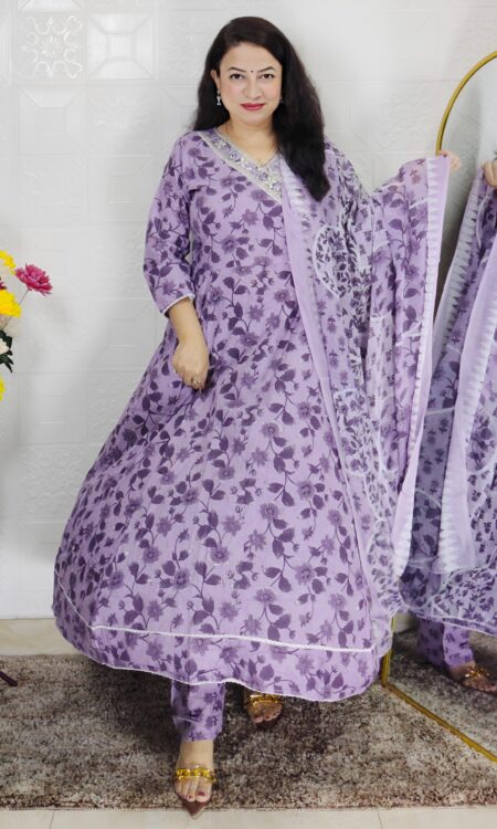 Woman wearing lavender floral printed Anarkali suit set with matching dupatta