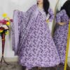 Woman wearing lavender floral printed Anarkali suit set with matching dupatta