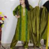 Woman wearing olive green tie-dye cotton suit set with matching pants and dupatta