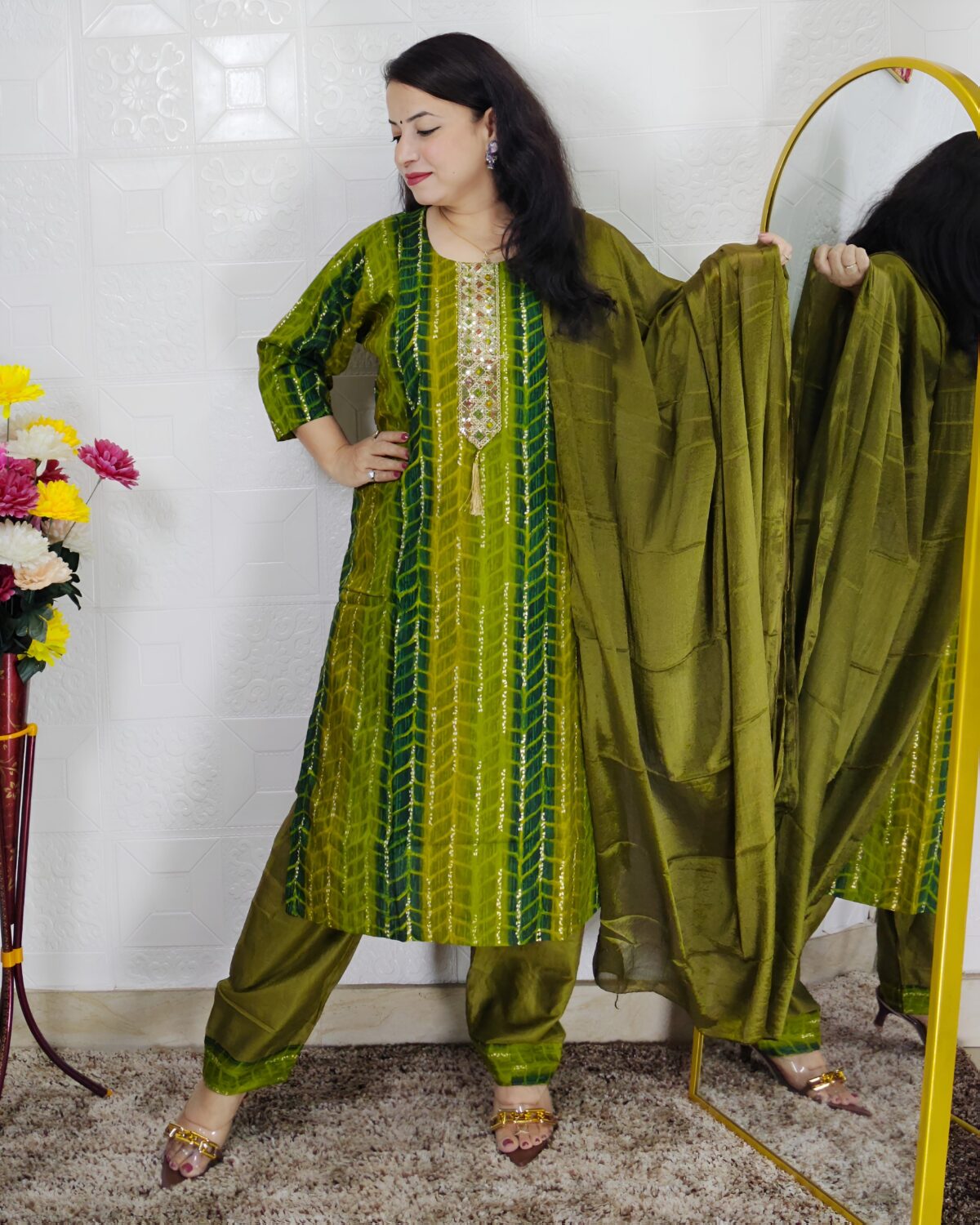 Woman wearing olive green tie-dye cotton suit set with matching pants and dupatta