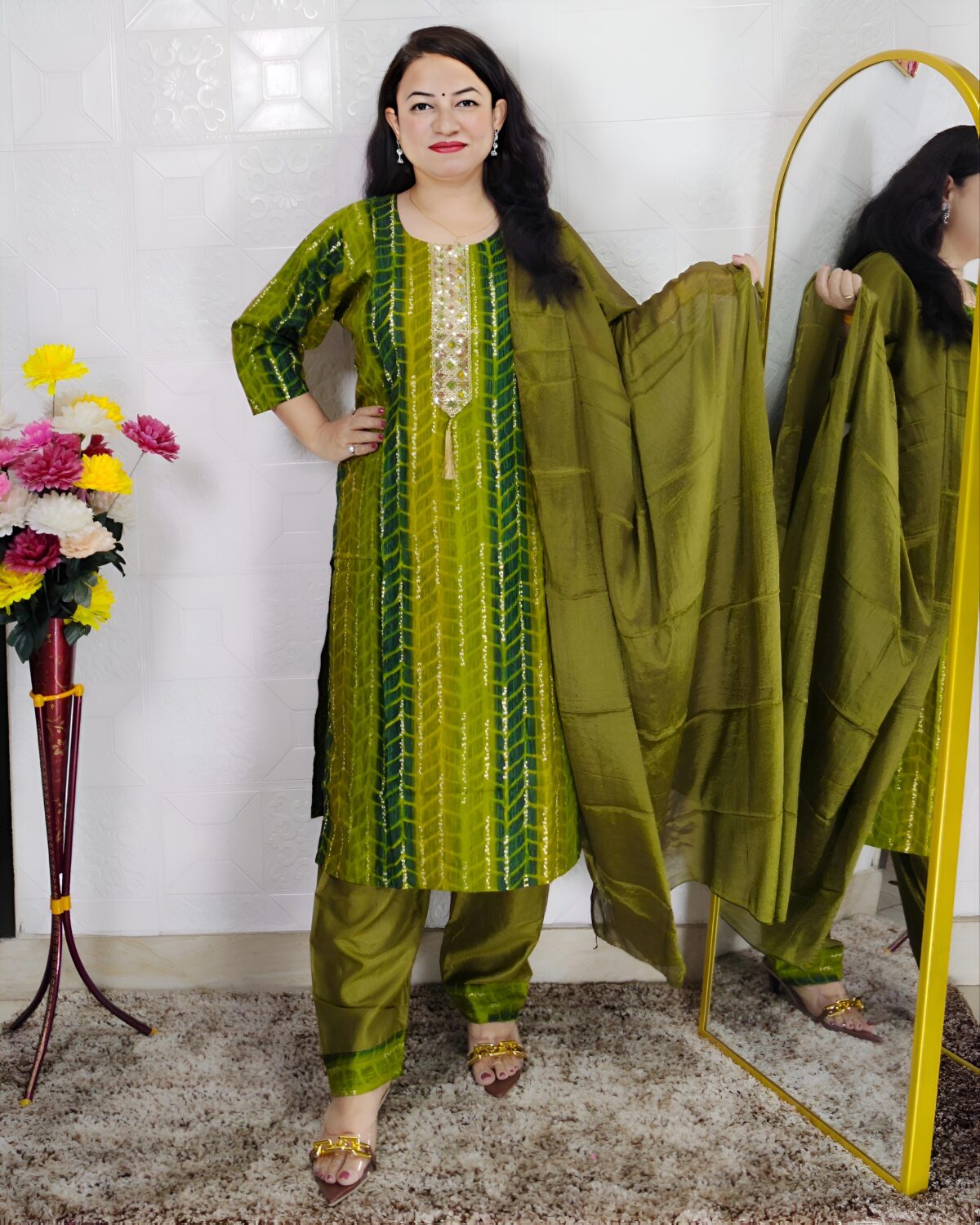 Woman wearing olive green tie-dye cotton suit set with matching pants and dupatta