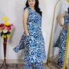 Woman wearing Blue Abstract Printed Cotton Co-Ord Set with Sleeveless Kurta, Wide-Leg Pants and Side Pocket