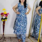 Woman wearing Blue Abstract Printed Cotton Co-Ord Set with Sleeveless Kurta, Wide-Leg Pants and Side Pocket