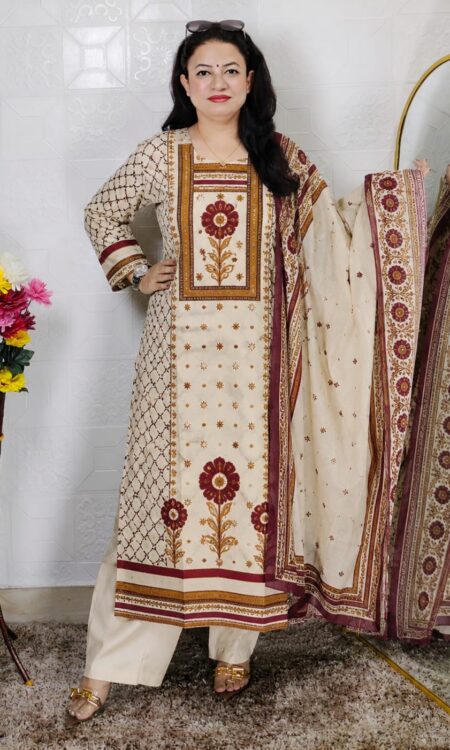 Woman wearing Off White Premium Cotton Printed Straight Kurta with Matching Pants and Coordinated Printed Dupatta