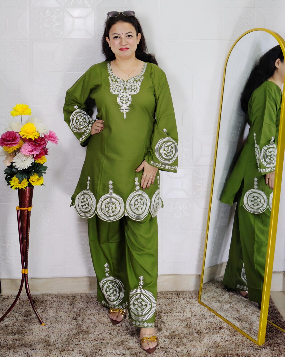 Woman wearing Premium Cotton Embroidered Co-Ord Set with Embroidered Kurta and Matching Pants available in Black, Green, Brown and Maroon colors