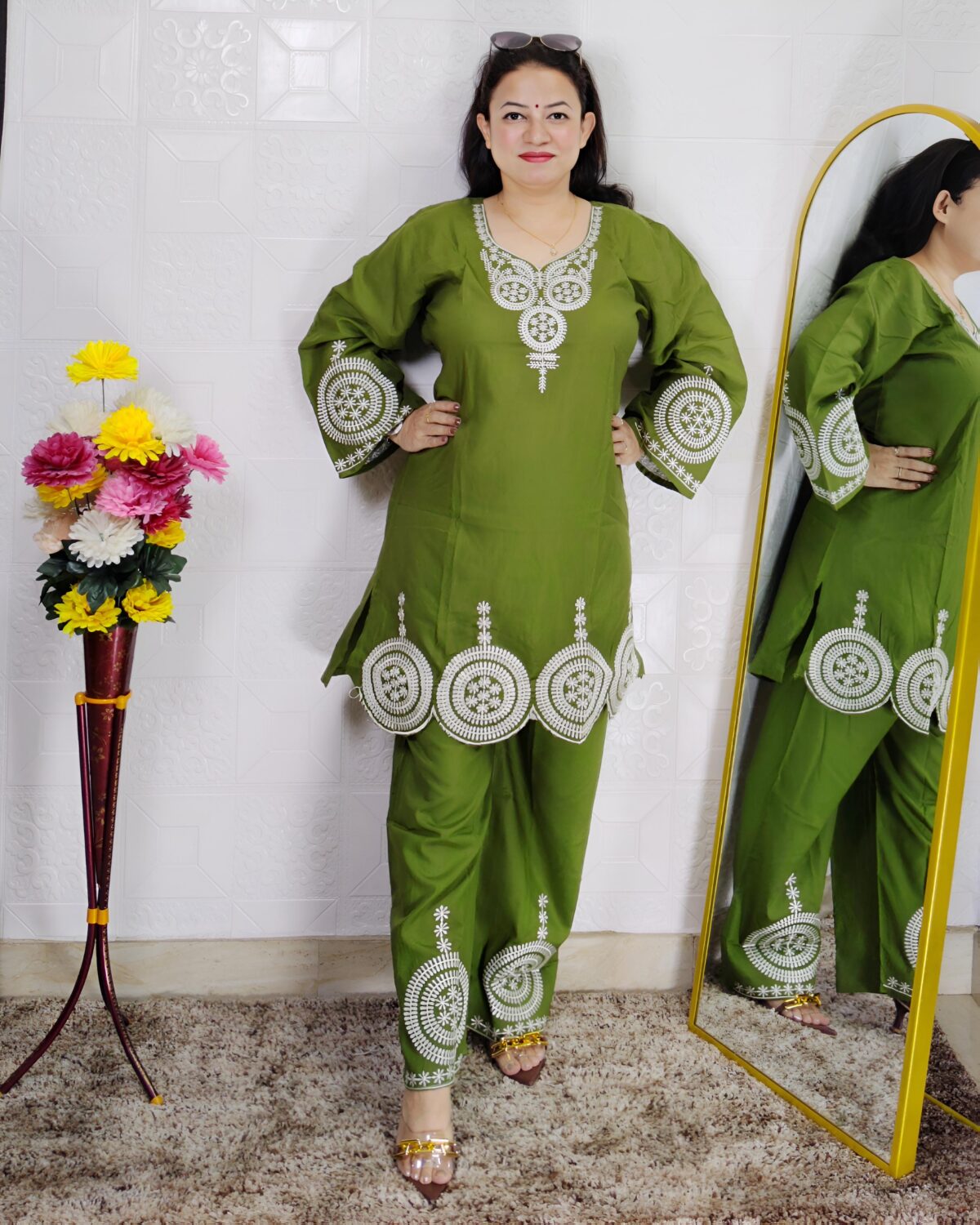 Woman wearing Premium Cotton Embroidered Co-Ord Set with Embroidered Kurta and Matching Pants available in Black, Green, Brown and Maroon colors