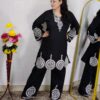 Woman wearing Premium Cotton Embroidered Co-Ord Set with Embroidered Kurta and Matching Pants available in Black, Green, Brown and Maroon colors