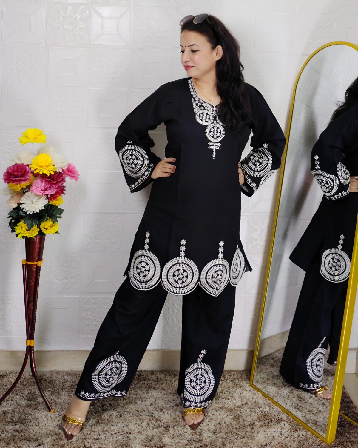 Woman wearing Premium Cotton Embroidered Co-Ord Set with Embroidered Kurta and Matching Pants available in Black, Green, Brown and Maroon colors